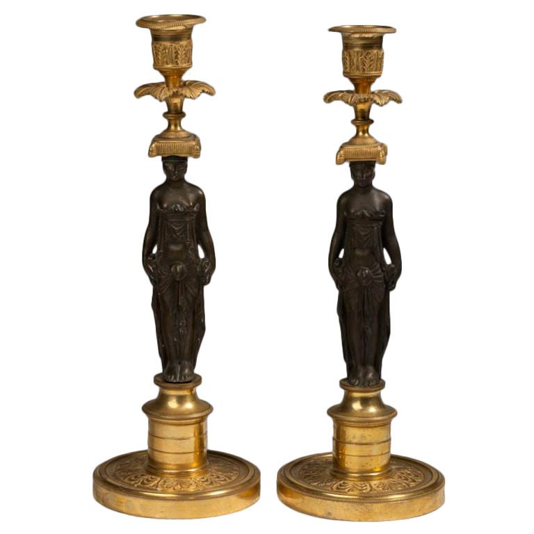 Pair of Regency figural candlesticks, 19th century